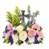 This is a serene arrangement that balances traditional elegance with a gentle