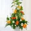 Orange, green and white flowers, Roses, Lyzianthus and Liles presented in a