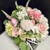 Our softest pink seasonal mix, arranged low and dense in our signature