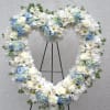 The Sending Our Love memorial heart is a beautiful and heartfelt floral