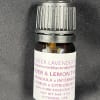 Small amber bottle of lavender and lemon essential oil with a black cap