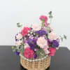 A charming small flower basket arrangement designed to brighten someone&rsquo;s day.
This delicate