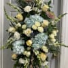 Light Blue Hydrangea, White Roses, Light Yellow Roses, Snapdragons, Stock, Carnations, Fancy