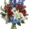 Perfectly patriotic with its red, white and blue blooms, this bold bouquet