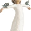 Wooden angel figurine in a white dress with outstretched arms