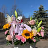 A delightful spring arrangement designed to celebrate the beauty of the season.