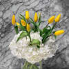 A fresh and uplifting arrangement that captures the feeling of early spring.