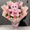 Two-tone roses in one, pink teddy bear, Ferrero Rocher chocolates encapsulated in