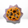 Bouquet of yellow sunflowers with butterfly picks and a birthday topper