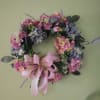 This colorful hydrangea wreath is a lovely spring-themed addition to any door