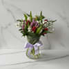 Celebrate the beauty of the season with our Spring Garden Tulip Arrangement
