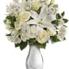 All is calm, all is white in this exquisite bouquet featuring white