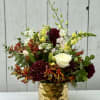 A gorgeous arrangement with all the colors of the desert. The dahlias