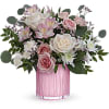 Teleflora's Posh Pink Bouquet has creamy roses and delicate pink blooms which