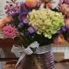 Enjoy the excitement of a beautiful bouquet personally designed.