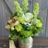 The Pot of gold arrangement is bound to make your recipient smile