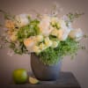 Soft, luminous, and effortlessly elegant, Brillante features layers of creamy garden roses