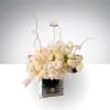 A graceful and modern floral arrangement featuring white hydrangeas, premium roses, delicate