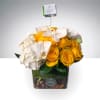 Golden Orchid Garden is a sophisticated and radiant floral arrangement designed to