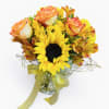 Sunshine in a vase ️

This vibrant arrangement bursts with cheerful sunflowers, warm