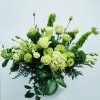 Lush, fresh, monochrome with premium blooms in shades of green.