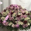 This casket cover is lovely. Made up of all white, lavender and