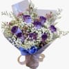 The Purple Fairy bouquet features exquisite misty purple roses and delicate baby's