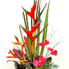 Brighten any space with our stylish tall arrangement, featuring an exquisite selection