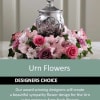 This is a designers choice of a beautiful arrangement of flowers around