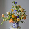 Textural and playful in design in a blue and white floral pot