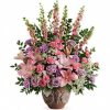 A traditional mix of all soft and subtle colored flowers and assorted