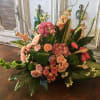 Garden-style bouquet with lush peach flowers.(one side look)