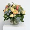 Send the beauty and freshness of spring with a bouquet featuring peach