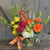 This fun and whimsical arrangement is bound to brighten anyone's day. Flowers