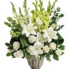 "Peaceful and majestic, this wondrous white arrangement will touch your loved ones.
White
