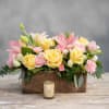 Enjoy this wooden rectangular box full of lucious lemon colored roses accented