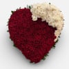 A beautiful heart shaped tribute of red and ivory roses, symbolizing, everlasting
