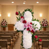 Everlasting Love Cross Standing Spray
Celebrate a life of faith and heartfelt devotion