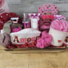 Love is in the air with this gift basket. More Amor Por