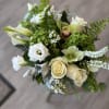 Bright and full of charm, the verdant joy arrangement is a stunning