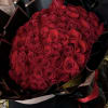 Radiant Love, a breathtaking bouquet of 100 premium red roses, elegantly wrapped;