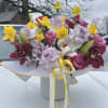 very beautiful arrangement of roses, orchids, daffodils or tulips according to the