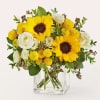 &ldquo;Brighten any day with this cheerful and radiant sunflower arrangement! Featuring bold