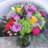 This arrangement has alstroemeria, roses, spray roses, carnations, queen Ann&rsquo;s lace, lisianthus