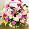 This luxurious large full bodied basket of pink and white flowers is