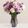 A mix of blooms in the sweetest shades of lavenders and white