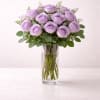A timeless arrangement of twelve beautiful lavender roses, thoughtfully designed in a
