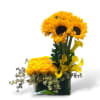 This bright arrangement has sunflowers, yellow roses, and yellow calla lilies. 