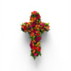 A lush cross-shaped arrangement alive with orange, hot pink, red and lime-green