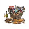 Overflowing with an abundant party-ready spread, this gourmet gift basket is the
